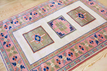 Load image into Gallery viewer, 4x5 Vintage Western Anatolian 'Yoruk' Turkish Area Rug | Three medallion field on ivory field with pink border | SKU 339