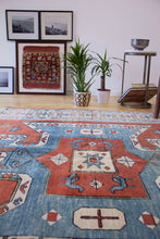 Load image into Gallery viewer, 6x8 Vintage Central Anatolian 'Yoruk' Turkish Area Rug with a rust field and 'shield Kazak' design geometric border | SKU 378