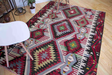 Load image into Gallery viewer, 5x7 Vintage Anatolian Turkish Kilim Area Rug with repeating medallions and tribal symbols | SKU 400