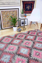 Load image into Gallery viewer, 6x10 Vintage Anatolian Turkish Kilim Area Rug | Interlocked pink gray geometric tribal symbols | SKU 409