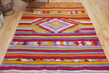 Load image into Gallery viewer, 5x7 Vintage Anatolian Turkish Kilim Area Rug | Strips with vibrant colors and bold medallion | SKU 417