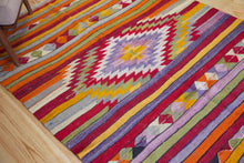 Load image into Gallery viewer, 5x7 Vintage Anatolian Turkish Kilim Area Rug | Strips with vibrant colors and bold medallion | SKU 417