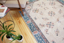 Load image into Gallery viewer, 6x9 Vintage Central Anatolian 'Oushak' Turkish Area Rug | Khotan style rug tribal designs on spacious field | SKU 437