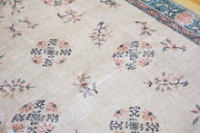 Load image into Gallery viewer, 6x9 Vintage Central Anatolian 'Oushak' Turkish Area Rug | Khotan style rug tribal designs on spacious field | SKU 437