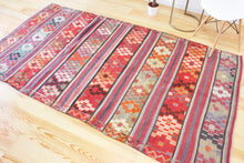 Load image into Gallery viewer, 5x8 Vintage Anatolian Turkish Kilim Area Rug | Strips with vibrant colors and bold symbols | SKU 452