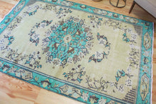 Load image into Gallery viewer, 5x8 Vintage Central Anatolian Oushak Style Turkish Area Rug | Bold turquoise medallion and border chartreuse field | SKU 508