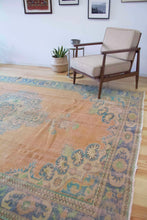 Load image into Gallery viewer, 7x11 Vintage Central Anatolian Oushak Style Turkish Area Rug | Bold medallion muted colors spacious field | SKU 512