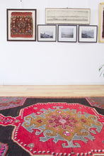 Load image into Gallery viewer, 5x7 Vintage Eastern Anatolian 'Kars' Turkish Area Rug | Single bold red medallion black field gray corners pink accents | SKU 513