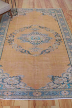Load image into Gallery viewer, 6x9 Vintage Central Anatolian Oushak Style Turkish Area Rug Bold Medallion Muted Colors Spacious Field Ornate Corners | SKU 605