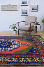 Load image into Gallery viewer, 6x9 Vintage Central Anatolian 'Taspinar' Turkish Area Rug | Bold Medallion Vibrant Colors Stylized Border | SKU 630