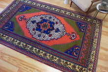 Load image into Gallery viewer, 6x9 Vintage Central Anatolian 'Taspinar' Turkish Area Rug | Bold Medallion Vibrant Colors Stylized Border | SKU 630