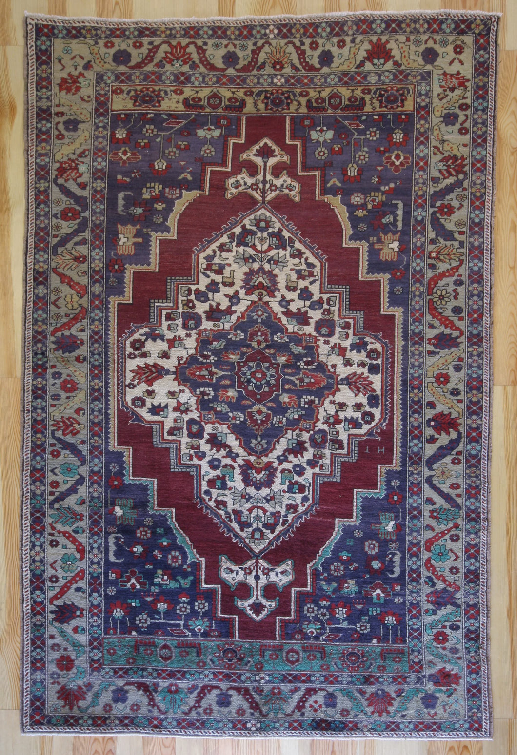 6x10 Vintage Central Anatolian 'Yesilhisar' Turkish Area Rug with large medallion on a bold field and flowers | SKU 328