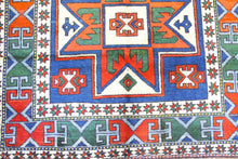 Load image into Gallery viewer, 5x8 Vintage Western Anatolian &#39;Sultanhan&#39; Turkish Area Rug with two geometric star medallions on a blue field | SKU 335
