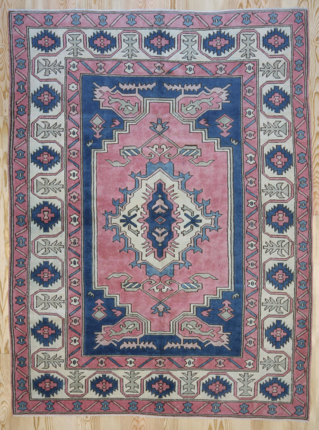 6x9 Vintage Central Anatolian 'Nigde' Turkish Area Rug | Unique medallion design on pink field geometric border | SKU 396