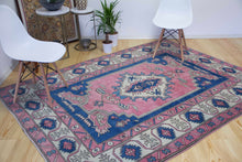 Load image into Gallery viewer, 6x9 Vintage Central Anatolian &#39;Nigde&#39; Turkish Area Rug | Unique medallion design on pink field geometric border | SKU 396
