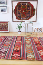 Load image into Gallery viewer, 5x8 Vintage Anatolian Turkish Kilim Area Rug | Strips with vibrant colors and bold symbols | SKU 452
