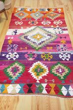 Load image into Gallery viewer, 4x8 Vintage Oversized Western Anatolian Kilim Area Rug | Bold medallion vibrant colors scattered tribal symbols | SKU 467
