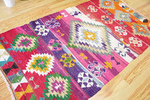 Load image into Gallery viewer, 4x8 Vintage Oversized Western Anatolian Kilim Area Rug | Bold medallion vibrant colors scattered tribal symbols | SKU 467
