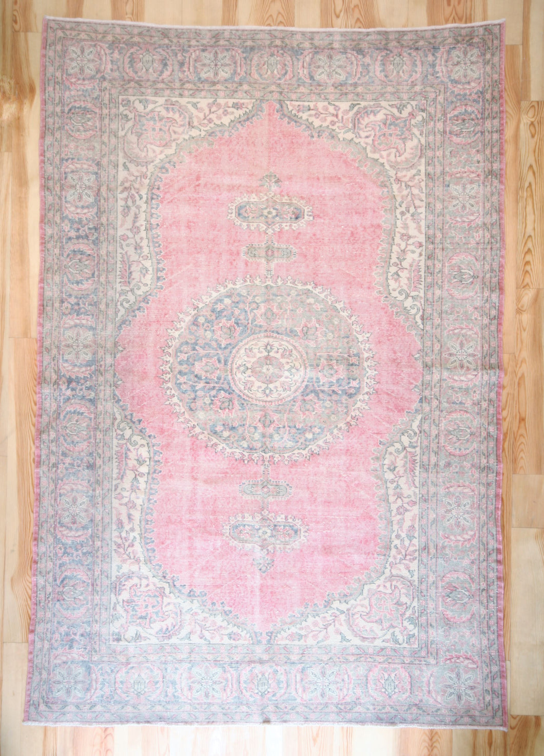 7x10 Vintage Central Anatolian Oushak Style Turkish Area Rug | Bold medallion spacious field floral border | SKU 496