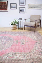 Load image into Gallery viewer, 7x10 Vintage Central Anatolian Oushak Style Turkish Area Rug | Bold medallion spacious field floral border | SKU 496
