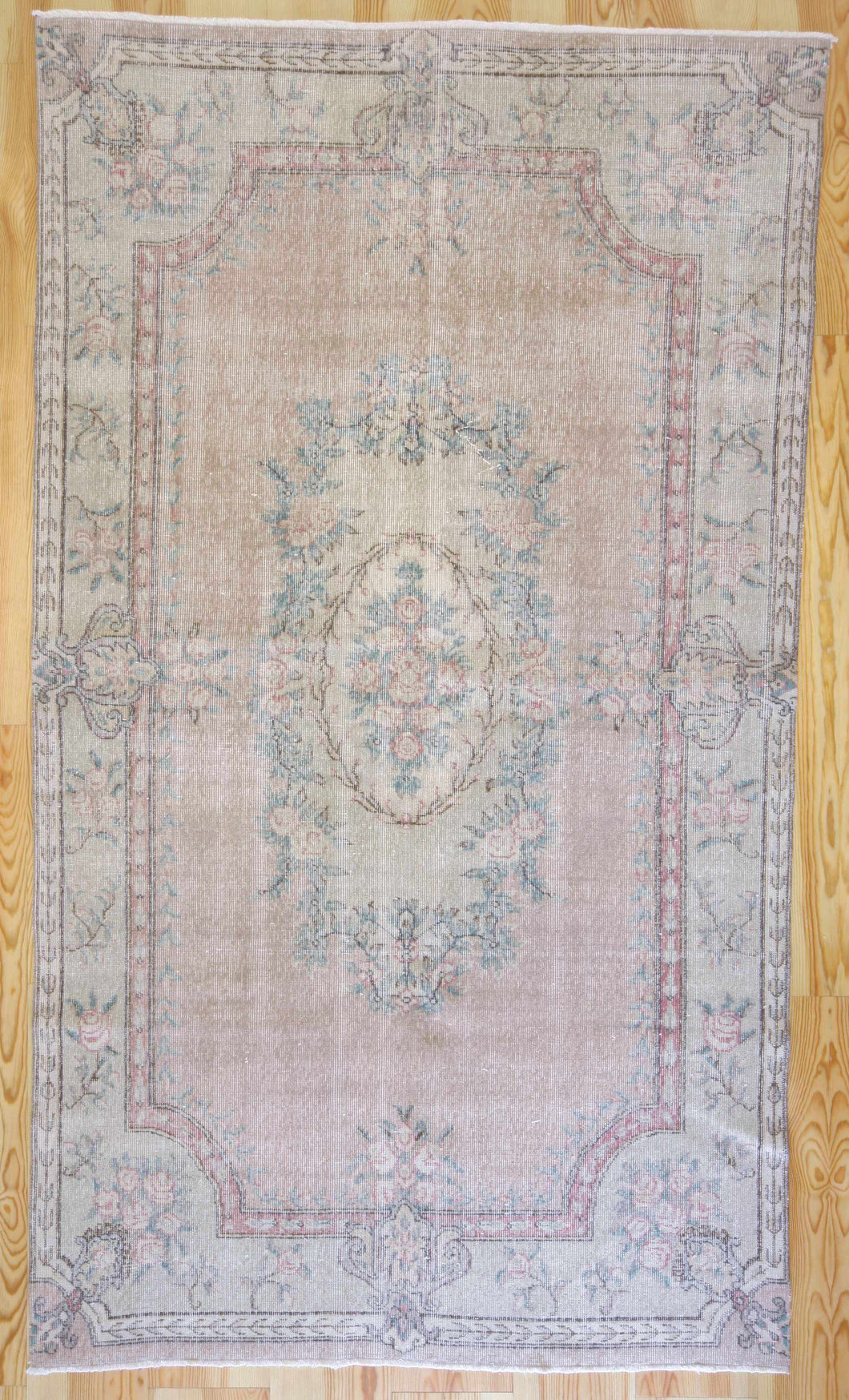 5x9 Vintage Central Anatolian Oushak Style Turkish Area Rug | Floral medallion, spacious design, muted colors | SKU 500