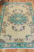 Load image into Gallery viewer, 5x8 Vintage Central Anatolian Oushak Style Turkish Area Rug | Bold turquoise medallion and border chartreuse field | SKU 508

