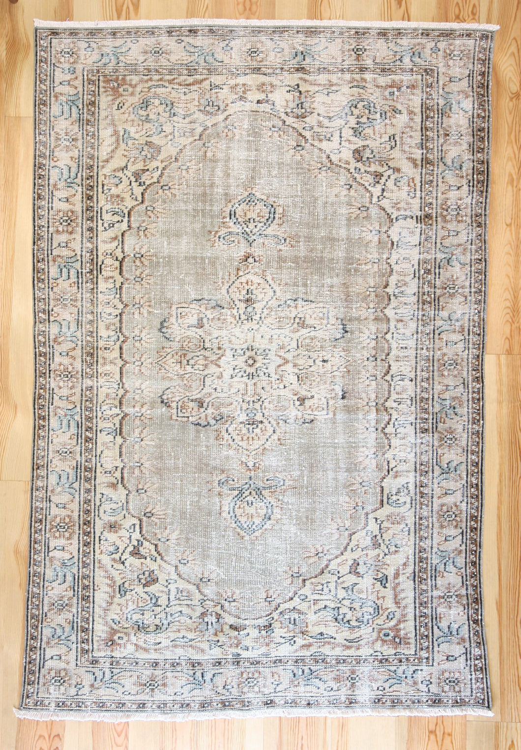6x9 Vintage Central Anatolian Oushak Style Gray Turkish Area Rug | Bold medallion spacious field floral border | SKU 510