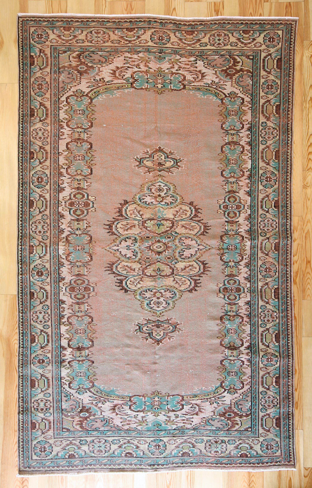 6x10 Vintage Central Anatolian Oushak Style Turkish Area Rug | Bold medallion spacious field floral border | SKU 511