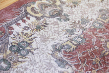 Load image into Gallery viewer, 6x9 Vintage Central Anatolian Oushak Style Turkish Area Rug | Floral medallion, spacious design, muted colors | SKU 523
