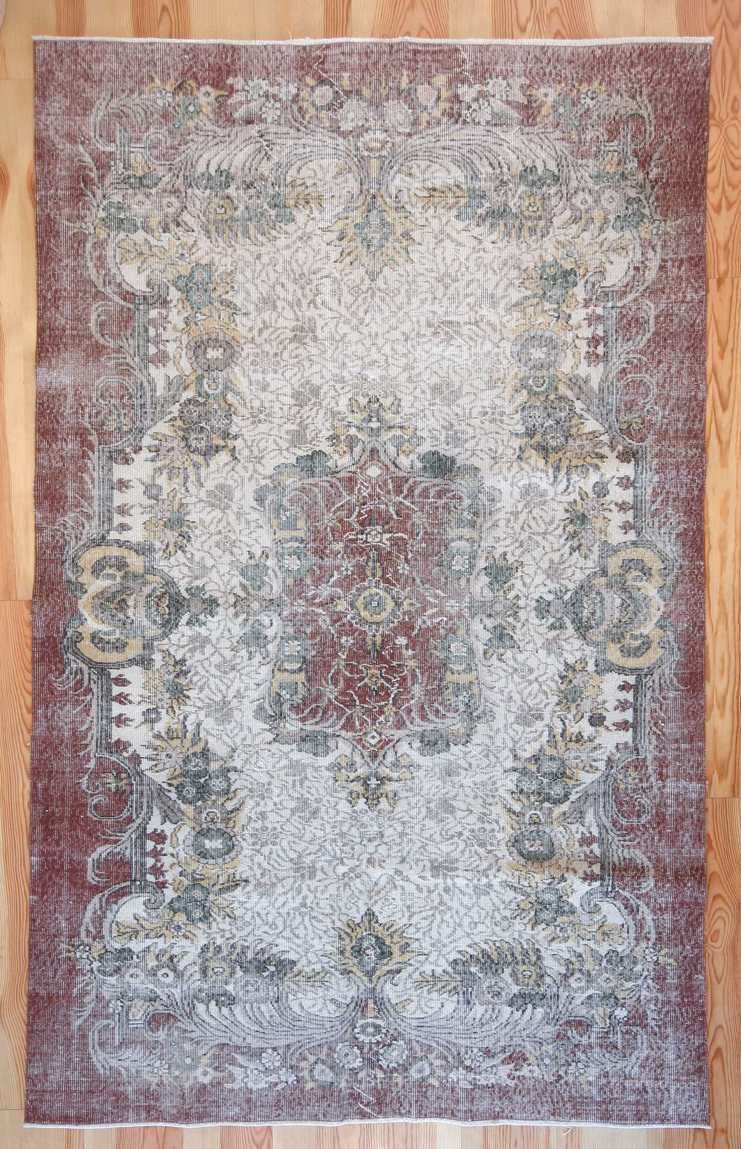 6x9 Vintage Central Anatolian Oushak Style Turkish Area Rug | Floral medallion, spacious design, muted colors | SKU 523