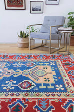 Load image into Gallery viewer, 6x10 Vintage Central Anatolian &#39;Aksaray&#39; Turkish Area Rug Bold Medallion Stylized Geometric Design Blue Field Red Border | SKU 550
