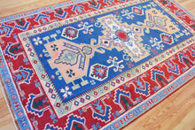 Load image into Gallery viewer, 6x10 Vintage Central Anatolian &#39;Aksaray&#39; Turkish Area Rug Bold Medallion Stylized Geometric Design Blue Field Red Border | SKU 550
