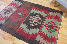 Load image into Gallery viewer, 5x7 Vintage Anatolian Turkish Kilim Area Rug | Bold geometric tribal symbols muted colors | SKU 551
