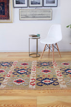 Load image into Gallery viewer, 4x6 Vintage Western Anatolian Turkish Kilim Area Rug | Repeating Tribal Symbols Soft Colors Symmetrical Geometric Design | SKU 598
