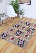 Load image into Gallery viewer, 4x6 Vintage Western Anatolian Turkish Kilim Area Rug | Repeating Tribal Symbols Soft Colors Symmetrical Geometric Design | SKU 598
