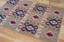 Load image into Gallery viewer, 4x6 Vintage Western Anatolian Turkish Kilim Area Rug | Repeating Tribal Symbols Soft Colors Symmetrical Geometric Design | SKU 598
