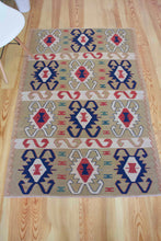 Load image into Gallery viewer, 4x6 Vintage Western Anatolian Turkish Kilim Area Rug | Repeating Tribal Symbols Soft Colors Symmetrical Geometric Design | SKU 598
