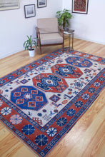 Load image into Gallery viewer, 6x9 Vintage Central Anatolian &#39;Yoruk&#39; Turkish Area Rug | Multiple Medallion Design on Light Field with Animal Motifs and Geometric Ornaments Geometric Border | SKU 631
