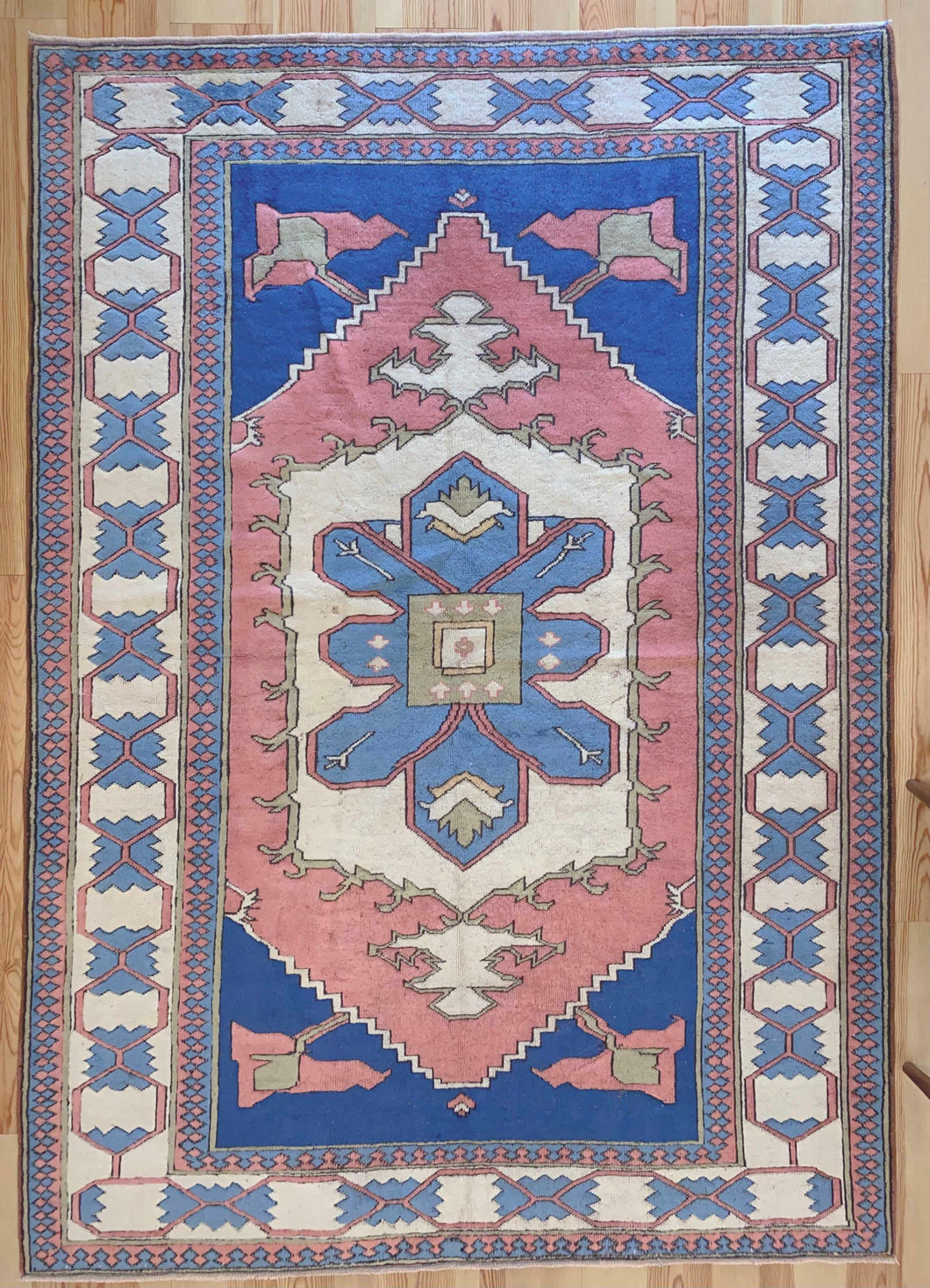 7x10 Vintage Central Anatolian 'Sultanhan' Turkish Area Rug | Bold Large Medallion on Spacious Field Simple Design Geometric Corners Stylized Border | SKU 647