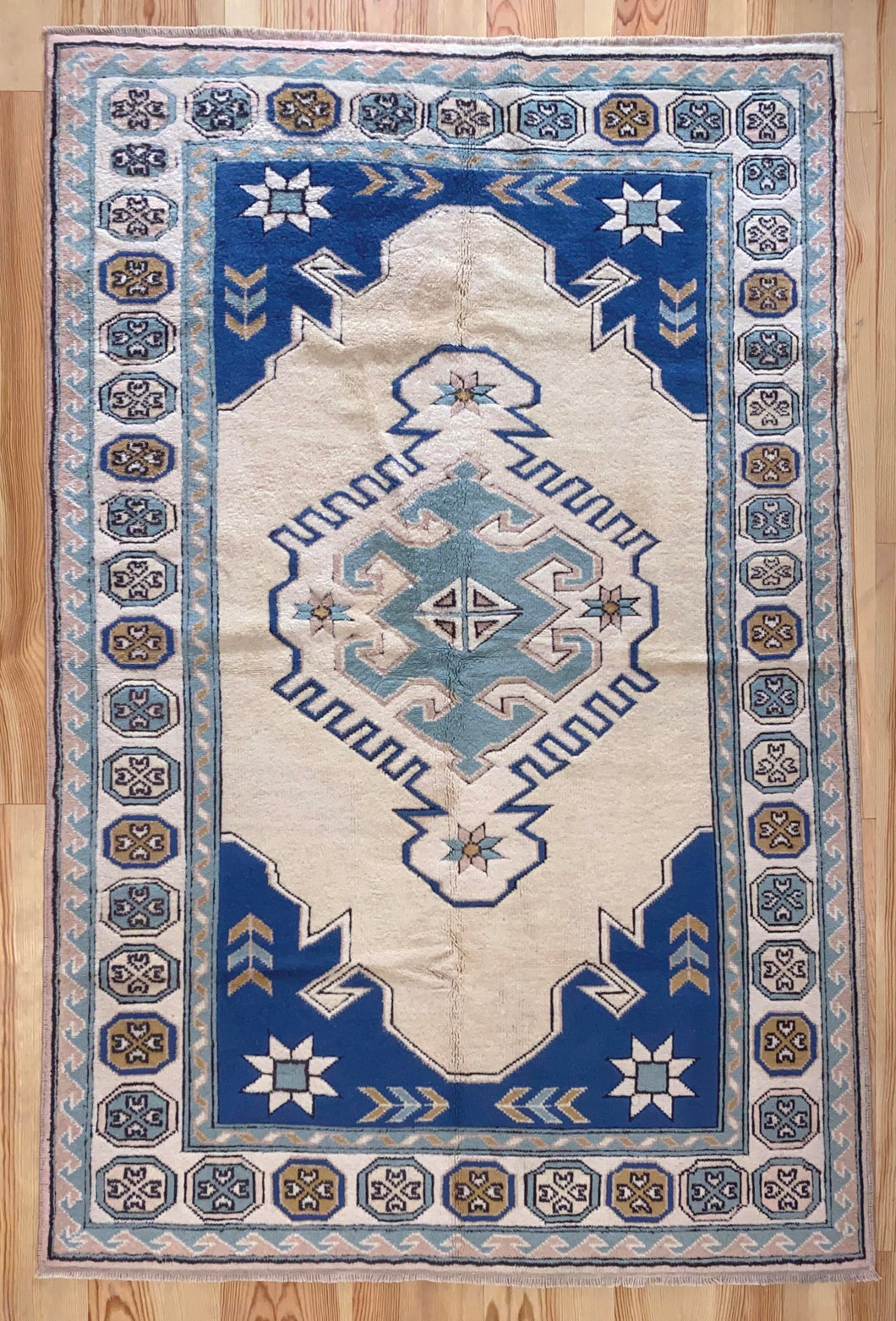 5x8 Vintage Central Anatolian 'Sultanhan' Turkish Rug | Bold Medallion Muted Colors Geometric Design | SKU 672